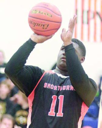 Tavondrick Ellison cans a free throw in the fourth quarter. Sticker Photo By Darrell Vyvjala