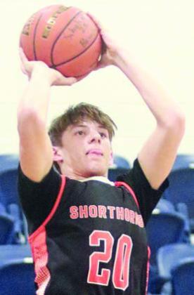 William Eudy hits a jump shot in the third quarter. Sticker Photo By Darrell Vyvjala