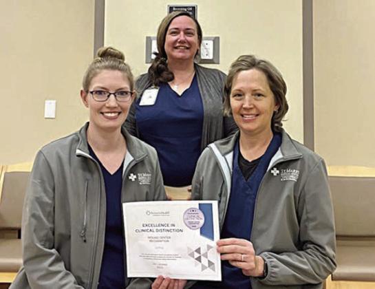 Staff at the St. Mark’s Advanced Outpatient Wound Center displaying the RestorixHealth recognition certificate includes (front row, from left) Jackie Faigle, FNP-C; Stacie Schramek, RN; and (back)Jennifer Scott, RN, program director.