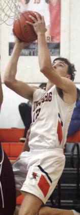Van Prihoda elevates at the basket to score in the second quarter last Tuesday. Sticker Photo By Darrell Vyvjala