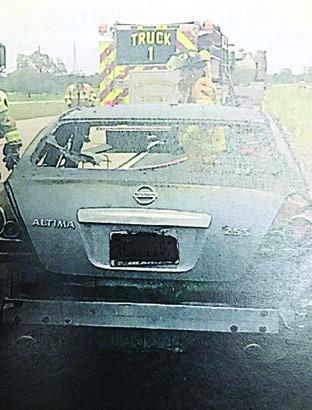 A 2011 Nissan Altima was a total loss after it caught fire while traveling on Highway 71 on Tuesday, May 2. Photo Courtesy of Fayette County Sheriff's Office