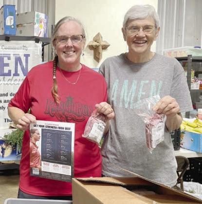 AMEN – (from left) Susie Shank, NVCW, with Susan Schultz, vice president of AMEN Food Pantry in La Grange.