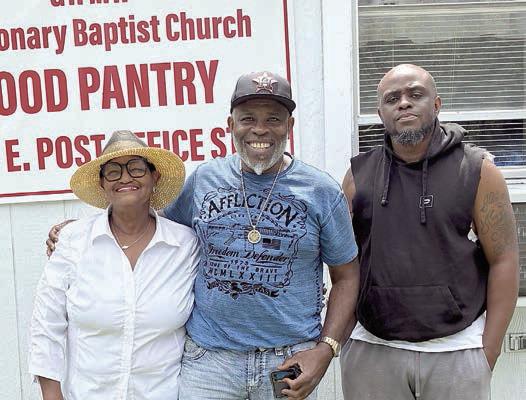 Greater Mount Arie Baptist Church – (from left) Jacqueline Figg, NVCW, with Pastor Dwight Davis of Greater Mount Arie Missionary Baptist Church in Weimar and Will Dancy Jr.