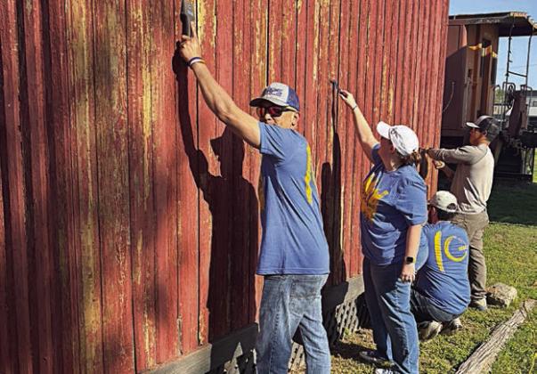 The old city jail in Flatonia received a coat of paint from LCRA employees during LCRA’s Steps Forward Day.