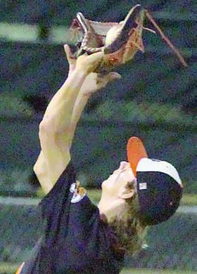 Connor Lichnovsky gathers in a Wildcat infield popup. Sticker Photo By Darrell Vyvjala