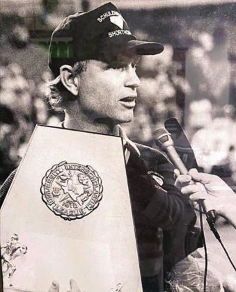 David Husmann gives an interview while holding the state championship trophy following the Shorthorns’ 35-20 win over Goldthwaite in the 1992 Class 2A title game played in the Astrodome.
