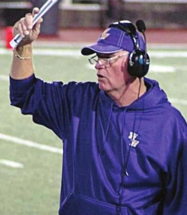 Husmann on the sideline for Weimar High School.
