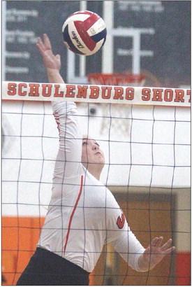 Reagan Dusek knocks down the final point in the Lady Horns’ sweep Tuesday afternoon. Sticker Photos By Darrell Vyvjala