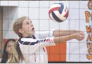 Madison Kunschick (top photo) and Clara Magliolo (bottom photo) get to Lady WIldcat attacks in the second game. Sticker Photos By Darrell Vyvjala