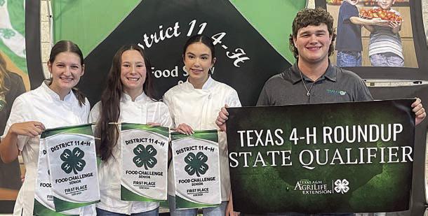 3 Girls in Chef Coats – (from left) Tori Newton, Eleanor Carey, Elena Supak and District 11 4-H Council officer Logan Poncik. The team placed first in the Senior Division side dish category and advances to the Texas 4-H Roundup.