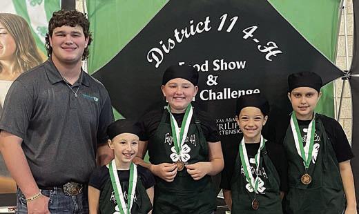 Slice and Dice – (from left) District 11 4-H Council officer Logan Poncik,Ainsley Murphy, Henley Sodek, Raelynn Beseda and Lydia Beseda.