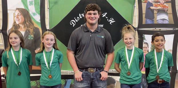 Kucumber Kids – (from left) Helen Streiff, McKenna Zarosky, District 11 4-H Council officer Logan Poncik, Langley Murphy and Cash O’Neal.