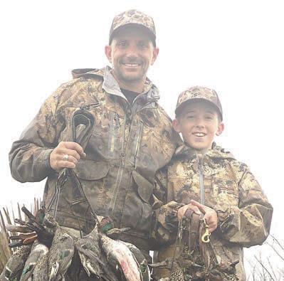 Third-place winner Cade Wessels of St. Michael Catholic School in Weimar, shown with his father Clayton Wessels.