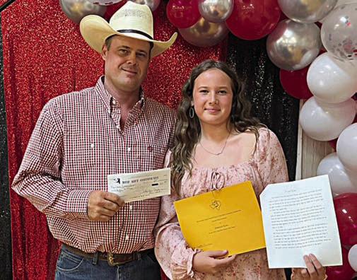 SSecond place-winner Annaston Kutac of St. Rose of Lima Catholic School in Schulenburg, shown with her father Aaron Kutac;.