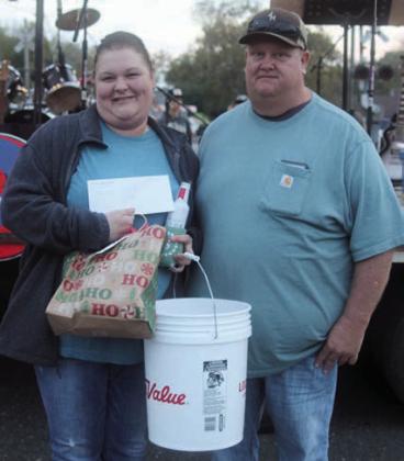 CHILI COOKOFF, SECOND PL ACE &amp; CHICKEN NOODLE SOUP COOKOFF, THIRD PL ACE: “FAYETTEVILLE COO KERS” – (from left) Mandy and Paul Wells. Sticker Photo By Darrell Vyvjala