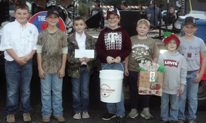 CHILI COOKOFF, THIRD PL ACE: “THE BEAN BROS.” – (from left) Abraham McBride, Crockett Guenther, Gage Smrkovsky, Clay Hoffmann, Wyatt Smrkovsky, Rowdy Guenther, and Layton Wick. Sticker Photo By Darrell Vyvjala