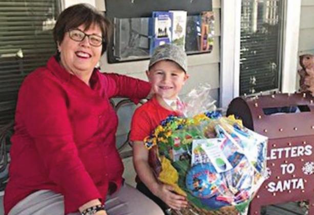 Gift Basket Winner – Brody Brossmann, shown with Terri Wagner (left), Chamber executive director.