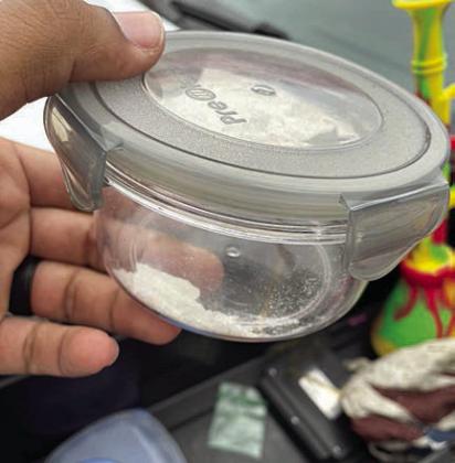 Shown above and at right are the drugs and weapons discovered by the SPD at a call last Thursday.