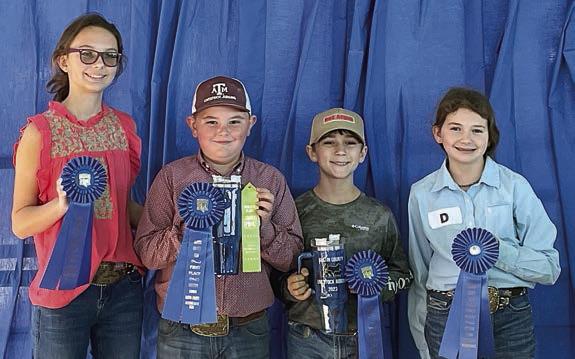 Champion Intermediat e Team – (from left) Tatum Fritsch, Abraham McBride, Crockett Guenther and Laramie Laake. McBride and Guenther are members of the Schulenburg 4-H.