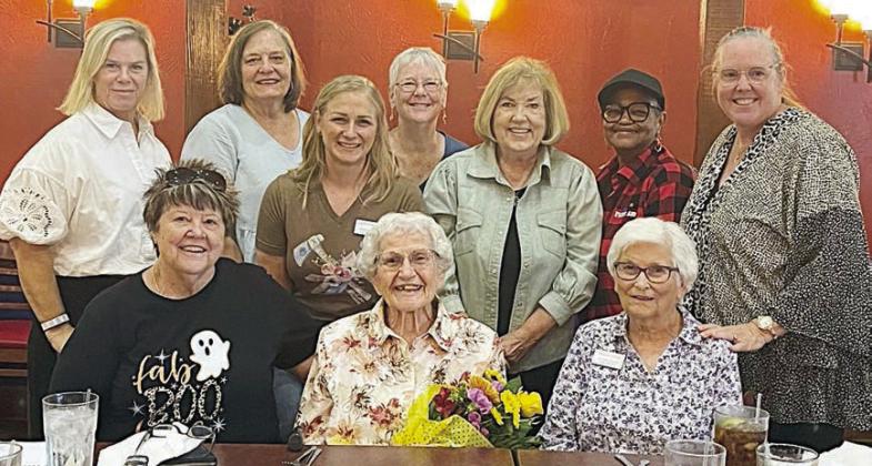 Elsie Farek was surprised by the Navidad Valley CattleWomen members at a recent meeting with the announcement that the collegiate scholarship was being named in her honor. Shown are (front row, from left) Sandi Warnken, Elsie Farek, Zoe Justiss, (back row) Meg Keilbach, Janet Spies, Caitlin Koliba, Jackie Harker, Kay Gibson, Jacqueline Figg and Susie Shank.