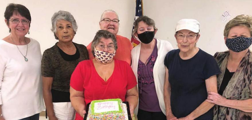 SEPTEMBER BIRTHDAY HONOREES – Navidad Valley Community Connections celebrated September birthdays on Monday, Sept. 28. Honorees included (front, holding cake) Carolyn Moore, (back, from left) Madeline Schneider, Mary Ramirez, Betty Gabler, Misty Schindler, Sandy Colvin and Judy Klesel.