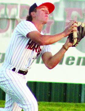Centerfielder Bryce Stoever makes a running catch against Ganado. Sticker Photo By Darrell Vyvjala