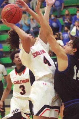 Jalen Wilson draws a foul on a thirdquarter drive. Sticker Photo By Layne Vyvjala