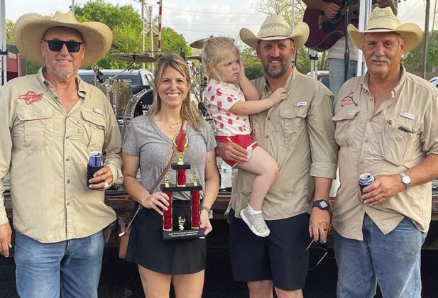 “BEER 30 COOKERS” – 2ND PLACE SAUSAGE-BASED CONCOCTIONS / SHOWMANSHIP – (from left) Arthur Mendoza, Emily and Jon Matus (holding daughter, Natalie), and Allen Matus.