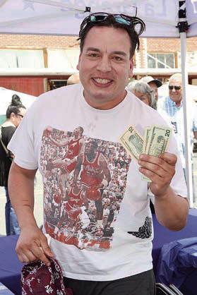 KOLACHEEATINGCONTESTWINNERS – Aldo Salas and (not shown) Laurie Sassin. Photo Courtesy of Gary Carpenter Photography