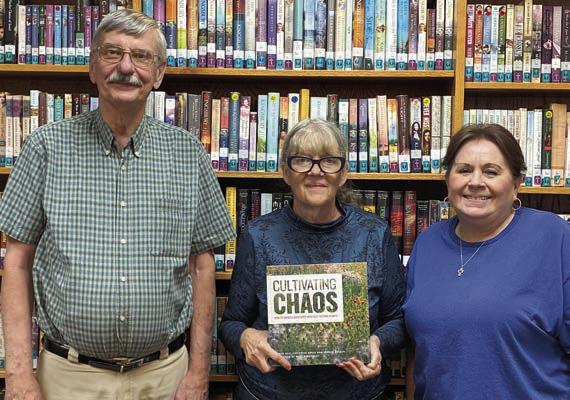 Garden Club donates book to library