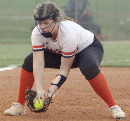 Third baseman Hailey Kahlden gloves a grounder for the final out of the top of the sixth inning of game one. Sticker Photo By Darrell Vyvjala