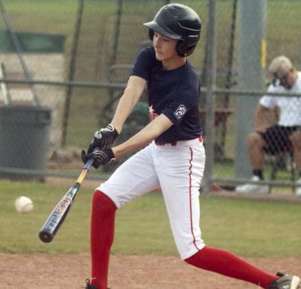 Austin Reeves connects for a hit in the fifth inning last Wednesday. Sticker Photo By Darrell Vyvjala