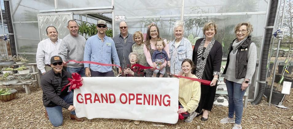 A ribbon cutting was held by the Schulenburg Chamber of Commerce at The B Haus Nursery &amp; Marketplace on Saturday, March 9. On hand were (front row, from left) Chip Bubela, Joyce Bubela, Macy Valenta, (back row) Rodney Kalich-Chamber of Commerce director, Alan Koehn, Colton Bubela-owner, Corky Bubela, Sherry Bubela, Morgan Bubela-owner holding daughter Martha Clare Bubela, Monica Heine, Terri Wagner-Chamber of Commerce executive director and Diana Mikesky-Chamber of Commerce president. Sticker Staff Photo
