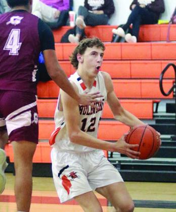 Van Prihoda drives past an Indian defender to tie the game in the third quarter. Sticker Photo By Darrell Vyvjala