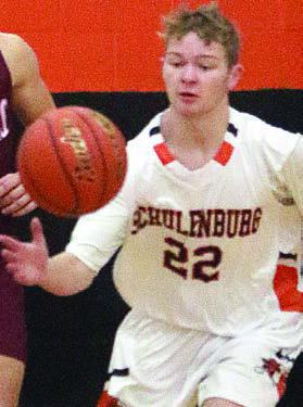Caden Herzik gets a steal late in the third quarter against Ganado. Sticker Photo By Darrell Vyvjala