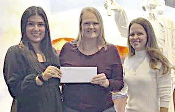 Fayett e County Community Theatr e Donation – Melanie Ramirez, representing Stanzel Family Foundation; Heather Barthelme, representing Fayette County Community Theatre; and Cheryl Pekar, representing Stanzel Family Foundation.
