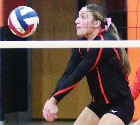 Greenli Van Zandt gets to a deflected attack in the first set of the Shiner match. Sticker Photo By Darrell Vyvjala