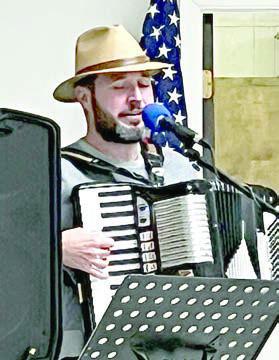 Super Dave Hollas, local musician, plays at Senior Connections.