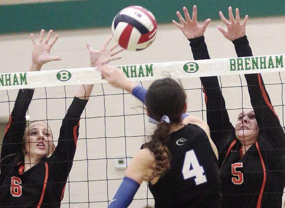 Clara Magliolo (left) and Haylee Vacek in the third game. Sticker Photo By Darrell Vyvjala