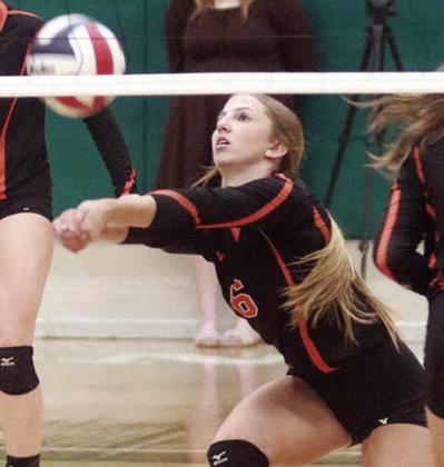 Clara Magliolo in the opening game. Sticker Photo By Darrell Vyvjala