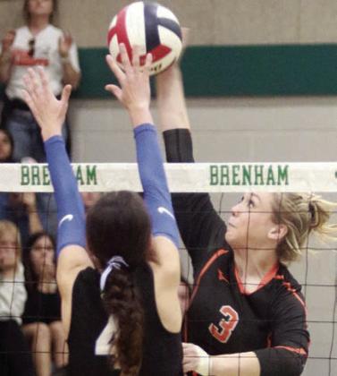Reagan Dusek in the final set. Sticker Photo By Darrell Vyvjala