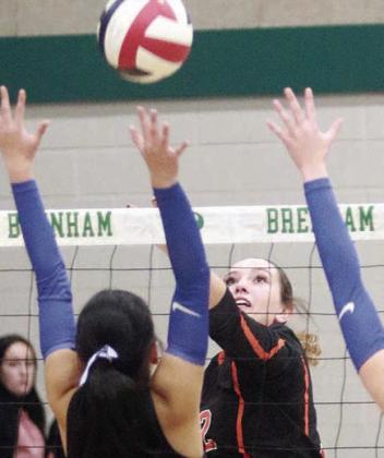 Grace Schramek in the game one. Sticker Photo By Darrell Vyvjala