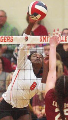 Jessalyn Gipson ends game three with a kill. Sticker Photo By Darrell Vyvjala