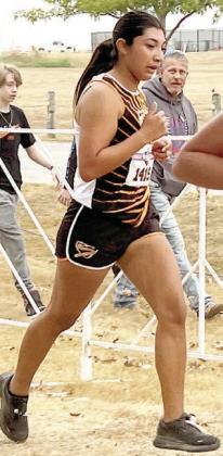 Ruby Rodriguez runs at the state cross country in Round Rock last Friday morning.