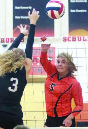Haylee Vacek registers a kill against Fayetteville. Sticker Photo By Darrell Vyvjala