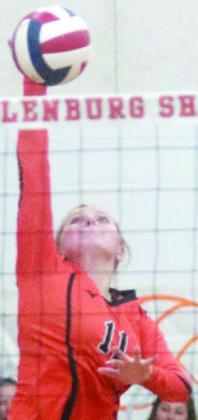 Saybra Pinney sends an attack over the net in the first match of the Lady Horn Classic. Sticker Photo By Darrell Vyvjala
