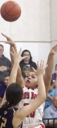 Arianna Vincent hits a shot jump shot in the second quarter Friday. Sticker Photo By Darrell Vyvjala