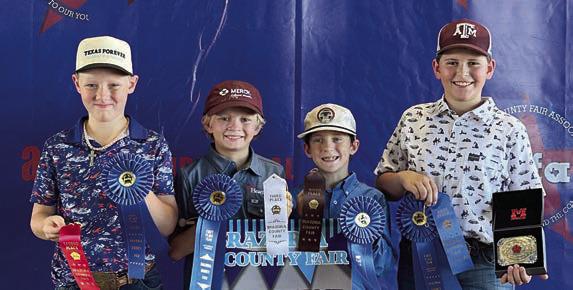 Cha mpion Junior Team – (from left) Jehnsen Janecka, Joe Carrales, Rowdy Guenther and Hudson Holub.