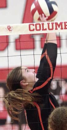 Landry Zapalac sets her 56th assist for the match-ending point. Sticker Photo By Darrell Vyvjala