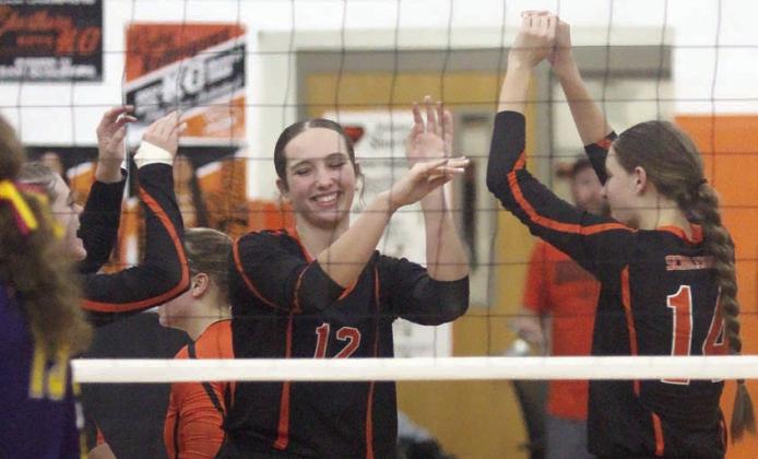 High fives after five-set win